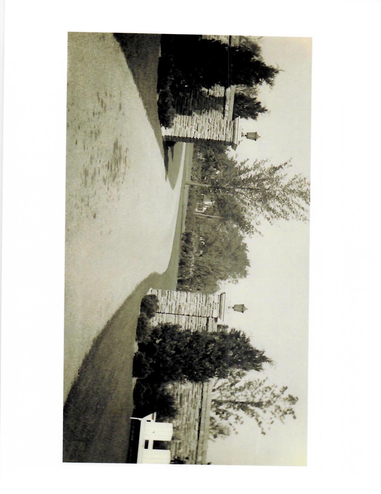 The stone entrance gates, archival photograph