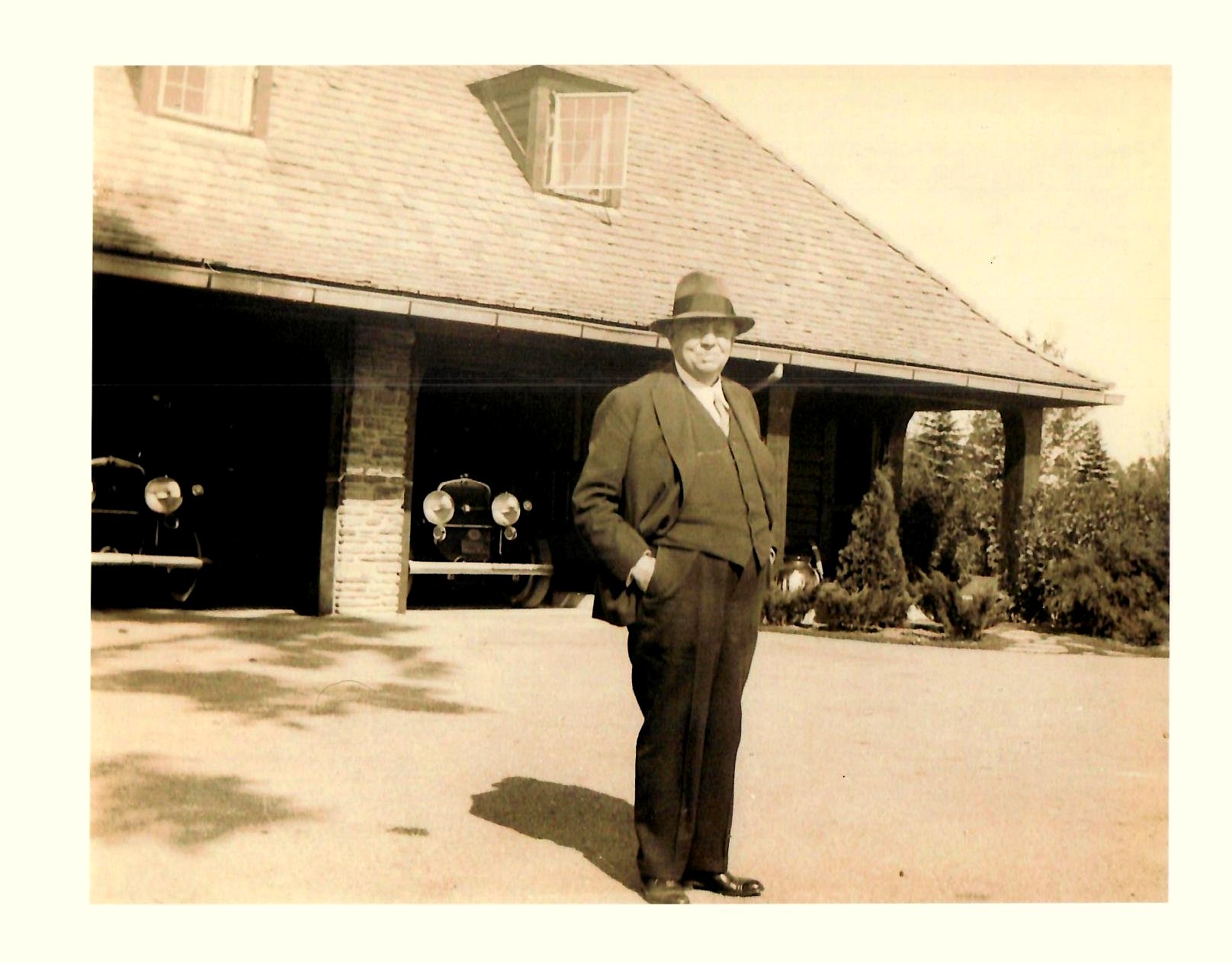 James Selden in front of the carriage house, c. 1925